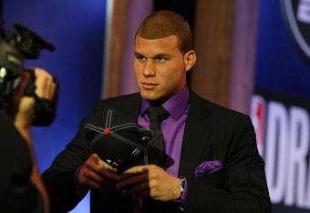 NEW YORK - JUNE 25:  First overall draft pick by the Los Angeles Clippers,  Blake Griffin is congratulated by members of his entourage during the 2009 NBA Draft at the Wamu Theatre at Madison Square Garden June 25, 2009 in New York City. NOTE TO USER: User expressly acknowledges and agrees that, by downloading and/or using this Photograph, User is consenting to the terms and conditions of the Getty Images License Agreement.  (Photo by Jim McIsaac/Getty Images)