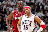 EAST RUTHERFORD, NJ - APRIL 28:  Vince Carter #15 of the New Jersey Nets and Shaquille O'Neal #32 of the Miami Heat look on during a break in Game three of the Eastern Conference Quarterfinals during the 2005 NBA Playoffs at Continental Airline Arena on April 28, 2005 in East Rutherford, New Jersey. The Heat defeated the Nets 108-105 in double overtime.  NOTE TO USER: User expressly acknowledges and agrees that, by downloading and/or using this Photograph, user is consenting to the terms and conditions of the Getty Images License Agreement.  (Photo by Jim McIsaac/Getty Images)