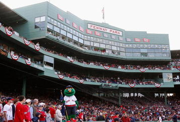 BOSTON - OCTOBER 13:  The Boston Red Sox mascot, Wally the Green Monster stands on the dugout inbetween innings of game three of the American League Championship Series against the Tampa Bay Rays during the 2008 MLB playoffs at Fenway Park on October 13, 2008 in Boston, Massachusetts.  (Photo by Jim Rogash/Getty Images)