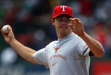 ARLINGTON, TX - MAY 25:  Quarterback Colt McCoy of the Texas Longhorns throws out the ceremonial first pitch before a game between the New York Yankees and the Texas Rangers on May 25, 2009 at Rangers Ballpark in Arlington, Texas.  (Photo by Ronald Martinez/Getty Images)
