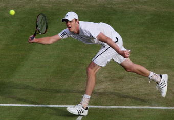 WIMBLEDON, ENGLAND - JUNE 24:  Sam Querrey of USA plays a forehand during the men's singles second round match against Marin Cilic of Croatia on Day Three of the Wimbledon Lawn Tennis Championships at the All England Lawn Tennis and Croquet Club on June 24, 2009 in London, England.  (Photo by Hamish Blair/Getty Images)