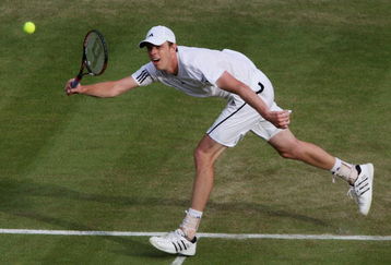 WIMBLEDON, ENGLAND - JUNE 24:  Sam Querrey of USA plays a forehand during the men's singles second round match against Marin Cilic of Croatia on Day Three of the Wimbledon Lawn Tennis Championships at the All England Lawn Tennis and Croquet Club on June 24, 2009 in London, England.  (Photo by Hamish Blair/Getty Images)