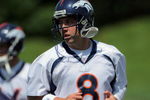 ENGLEWOOD, CO - JUNE 12:  Quarterback Kyle Orton #8 of the Denver Broncos warms up during minicamp practice at the Broncos Dove Valley training facility on June 12, 2009 in Englewood, Colorado.  (Photo by Doug Pensinger/Getty Images)