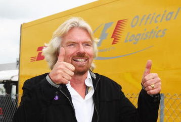 NORTHAMPTON, UNITED KINGDOM - JUNE 21:  Sir Richard Branson is seen in the paddock before the British Formula One Grand Prix at Silverstone on June 21, 2009 in Northampton, England.  (Photo by Clive Mason/Getty Images)