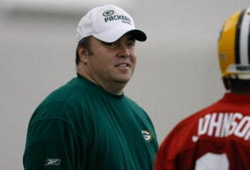 GREEN BAY, WI - MAY 1:  Head coach Mike McCarthy talks with quarterback Brian Johnson #8 in practice drills during Green Bay Packers Minicamp at Don Hutson Center on May 1, 2009 in Green Bay, Wisconsin. (Photo by Scott Boehm/Getty Images)