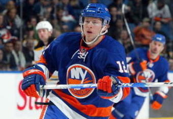 UNIONDALE, NY - APRIL 12:  Josh Bailey #12 of the New York Islanders skates against the the Boston Bruins on April 12, 2009 at Nassau Coliseum in Uniondale, New York. The Bruins won the game 6-2.  (Photo by Jim McIsaac/Getty Images)