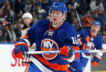 UNIONDALE, NY - APRIL 12:  Josh Bailey #12 of the New York Islanders skates against the the Boston Bruins on April 12, 2009 at Nassau Coliseum in Uniondale, New York. The Bruins won the game 6-2.  (Photo by Jim McIsaac/Getty Images)
