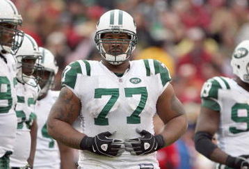 SAN FRANCISCO - DECEMBER 07:  Kris Jenkins #77 of the New York Jets stands on the field against the San Francisco 49ers during an NFL game on December 7, 2008 at Candlestick Park in San Francisco, California. (Photo by Jed Jacobsohn/Getty Images)