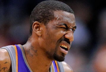 LOS ANGELES, CA - FEBRUARY 18:  Amar'e Stoudamire #1 of the Phoenix Suns reacts after getting a finger in his left eye during the first half against Los Angeles Clippers at the Staples Center on February 18, 2009 in Los Angeles, California. Stoudamire scored a game high 42 points and the Suns won, 142-119. NOTE TO USER: User expressly acknowledges and agrees that, by downloading and or using this photograph, User is consenting to the terms and conditions of the Getty Images License Agreement.  (Photo by Kevork Djansezian/Getty Images)