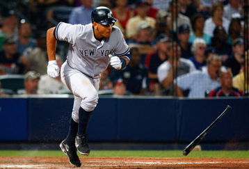 ATLANTA - JUNE 25:  Alex Rodriguez #13 of the New York Yankees scores two runs in the seventh inning on this base hit against the Atlanta Braves at Turner Field on June 25, 2009 in Atlanta, Georgia.  (Photo by Kevin C. Cox/Getty Images)