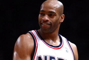 NEW YORK - MARCH 18: Vince Carter #15 of the New Jersey Nets watches on against the New York Knicks at Madison Square Garden March 18, 2009 in New York City. NOTE TO USER: User expressly acknowledges and agrees that, by downloading and/or using this Photograph, User is consenting to the terms and conditions of the Getty Images License Agreement. (Photo by Chris McGrath/Getty Images)