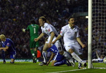 LEEDS, ENGLAND - MAY 14:  Luciano Becchio of Leeds United celebrates with Robert Snodgrass after scoring the opening goal during the Coca Cola League One play-off semi-final second leg match between Leeds United and Millwall at Elland Road on May 14, 2009 in Leeds, England.  (Photo by Alex Livesey/Getty Images)