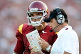 LOS ANGELES, CA - SEPTEMBER 13:  Mark Sanchez #6 of the USC Trojans talks with assistant coach Steve Sarkisian while taking on the Ohio State Buckeyes during the college football game at the Los Angeles Memorial Coliseum on September 13, 2008 in Los Angeles, California.  (Photo by Harry How/Getty Images)