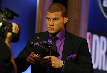 NEW YORK - JUNE 25:  First overall draft pick by the Los Angeles Clippers,  Blake Griffin is congratulated by members of his entourage during the 2009 NBA Draft at the Wamu Theatre at Madison Square Garden June 25, 2009 in New York City. NOTE TO USER: User expressly acknowledges and agrees that, by downloading and/or using this Photograph, User is consenting to the terms and conditions of the Getty Images License Agreement.  (Photo by Jim McIsaac/Getty Images)