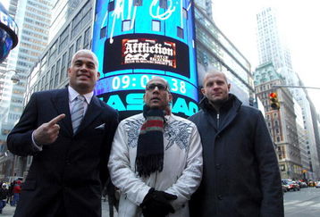 NEW YORK - JANUARY 20:  MMA fighter and former UFC light heavyweight champion Tito Ortiz, VP, Affliction Entertainment Tom Atencio and Fedor Vladimirovich Emelianenko, heavyweight mixed martial artist and current World Alliance of Mixed Martial Arts heavyweight champion rings the NASDAQ opening bell at NASDAQ in Times Square on January 20, 2009 in New York City.  (Photo by Joe Corrigan/Getty Images)