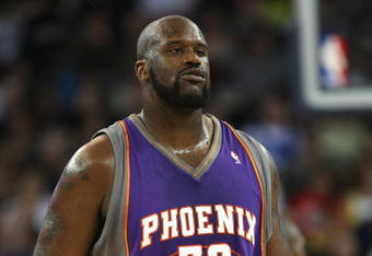 OAKLAND, CA - MARCH 15:  Shaquille O'Neal #32 of the Phoenix Suns looks on against the Golden State Warriors during an NBA game on March 15, 2009 at Oracle Arena in Oakland, California. NOTE TO USER: User expressly acknowledges and agrees that, by downloading and or using this photograph, User is consenting to the terms and conditions of the Getty Images License Agreement.  (Photo by Jed Jacobsohn/Getty Images)