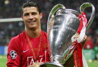MOSCOW - MAY 21:  Cristiano Ronaldo of Manchester United poses with the trophy following his team's victory during the UEFA Champions League Final match between Manchester United and Chelsea at the Luzhniki Stadium on May 21, 2008 in Moscow, Russia.  (Photo by Alex Livesey/Getty Images)