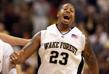 WINSTON-SALEM, NC - FEBRUARY 26: James Johnson #23 of the Wake Forest Demon Deacons reacts to a dunk against the North Carolina State Wolfpack during the Demon Deacons 85-78 victory at Lawrence Joel Coliseum on February 26, 2009 in Winston-Salem, North Carolina.  (Photo by Streeter Lecka/Getty Images)