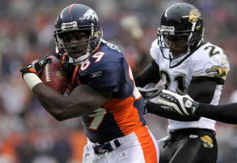 DENVER - OCTOBER 12:  Tight end Daniel Graham #89 of the Denver Broncos breaks the tackle of Drayton Florence #31 of the Jacksonville Jaguars as he scores the final points of the game on an 11 yard reception in the fourth quarter during NFL action at Invesco Field at Mile High on October 12, 2008 in Denver, Colorado. The Jaguars defeated the Broncos 24-17.  (Photo by Doug Pensinger/Getty Images)