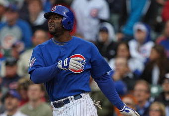 CHICAGO - MAY 27: Milton Bradlery #21 of the Chicago Cubs watches the flight of the ball against the Pittsburgh Pirates on May 27, 2009 at Wrigley Field in Chicago, Illinois. The Cubs defeated the Pirates 5-2.  (Photo by Jonathan Daniel/Getty Images)