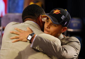 NEW YORK - JUNE 25:  Seventh overall draft pick by the Golden State Warriors,  Stephen Curry is congratulated by members of his entourage during the 2009 NBA Draft at the Wamu Theatre at Madison Square Garden June 25, 2009 in New York City. NOTE TO USER: User expressly acknowledges and agrees that, by downloading and/or using this Photograph, User is consenting to the terms and conditions of the Getty Images License Agreement.  (Photo by Jim McIsaac/Getty Images)