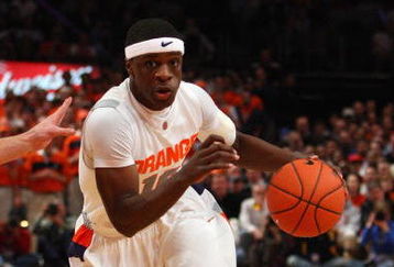 NEW YORK - MARCH 13:  Jonny Flynn #10 of the Syracuse Orange dribbles against the West Virginia Mountaineers during the semifinal round of the Big East Tournament at Madison Square Garden on March 13, 2009 in New York City. (Photo by Jim McIsaac/Getty Images)