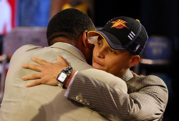 NEW YORK - JUNE 25:  Seventh overall draft pick by the Golden State Warriors,  Stephen Curry is congratulated by members of his entourage during the 2009 NBA Draft at the Wamu Theatre at Madison Square Garden June 25, 2009 in New York City. NOTE TO USER: User expressly acknowledges and agrees that, by downloading and/or using this Photograph, User is consenting to the terms and conditions of the Getty Images License Agreement.  (Photo by Jim McIsaac/Getty Images)