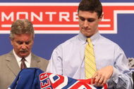 MONTREAL, QC - JUNE 26:  Chris Kreider puts on his  New York Rangers sweater after the Rangers selected him #19 overall during the first round of the 2009 NHL Entry Draft at the Bell Centre on June 26, 2009 in Montreal, Quebec, Canada.  (Photo by Bruce Bennett/Getty Images)