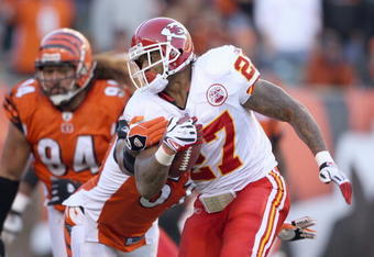 CINCINNATI - DECEMBER 28: Larry Johnson #27 of the Kansas City Chiefscarries the ball as he breaks a tackle during the NFL game against the Cincinnati Bengals on December 28, 2008 at Paul Brown Stadium in Cincinnati, Ohio.  (Photo by Andy Lyons/Getty Images)