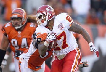 CINCINNATI - DECEMBER 28: Larry Johnson #27 of the Kansas City Chiefscarries the ball as he breaks a tackle during the NFL game against the Cincinnati Bengals on December 28, 2008 at Paul Brown Stadium in Cincinnati, Ohio.  (Photo by Andy Lyons/Getty Images)