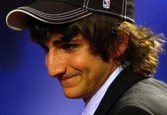 NEW YORK - JUNE 25:  Fifth overall draft pick by the Minnesota Timberwolves,  Ricky Rubio makes his way to the stage during the 2009 NBA Draft at the Wamu Theatre at Madison Square Garden June 25, 2009 in New York City. NOTE TO USER: User expressly acknowledges and agrees that, by downloading and/or using this Photograph, User is consenting to the terms and conditions of the Getty Images License Agreement.  (Photo by Jim McIsaac/Getty Images)