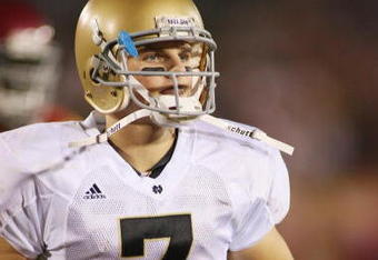 LOS ANGELES - NOVEMBER 29:  Jimmy Clausen #7 of the Notre Dame Fighting Irish walks on the field against the USC Trojans on November 29, 2008 at the Los Angeles Memorial Coliseum in Los Angeles, California.  USC won 38-3.  (Photo by Jeff Golden/Getty Images)