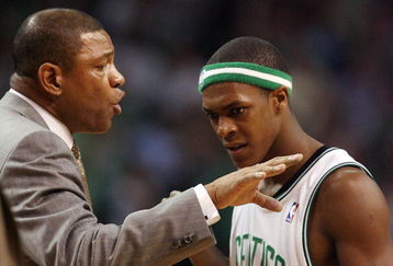 BOSTON - APRIL 28:  Head coach Doc Rivers talks with Rajon Rondo #9 of the Boston Celtics during a time out against the Chicago Bulls in Game Five of the Eastern Conference Quarterfinals during the 2009 NBA Playoffs at TD Banknorth Garden on April 28, 2009 in Boston, Massachusetts. The Celtics defeated the Bulls 106-104 in overtime. NOTE TO USER: User expressly acknowledges and agrees that, by downloading and or using this photograph, User is consenting to the terms and conditions of the Getty Images License Agreement.  (Photo by Elsa/Getty Images)