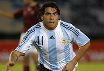 BUENOS AIRES, ARGENTINA - MARCH 28:  Carlos Tevez of Argentina celebrates the second goal during the 2010 FIFA World Cup South African qualifier match between Argentina and Venezuela at River Plate Stadium on March 28, 2009 in Buenos Aires, Argentina.  (Photo by Photogamma/Getty Images)