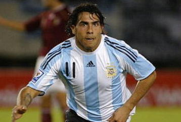 BUENOS AIRES, ARGENTINA - MARCH 28:  Carlos Tevez of Argentina celebrates the second goal during the 2010 FIFA World Cup South African qualifier match between Argentina and Venezuela at River Plate Stadium on March 28, 2009 in Buenos Aires, Argentina.  (Photo by Photogamma/Getty Images)