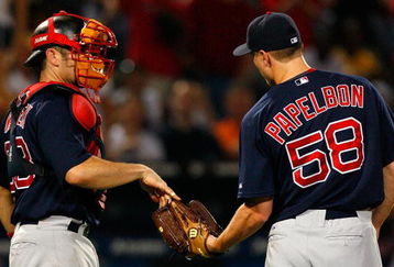 ATLANTA - JUNE 26:  Catcher Jason Varitek #33 of the Boston Red Sox congratulates pitcher Jonathan Papelbon #58 after a 4-1 win over the Atlanta Braves at Turner Field on June 26, 2009 in Atlanta, Georgia.  (Photo by Kevin C. Cox/Getty Images)