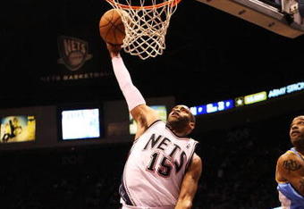 EAST RUTHERFORD, NJ - MARCH 21:  Vince Carter #15 of the New Jersey Nets dunks against the Denver Nuggets during their game on March 21, 2008 at the Izod Arena in East Rutherford, New Jersey.  Photo By Al Bello/Getty Images.  NOTE TO USER: User expressly acknowledges and agrees that, by downloading and/or using this Photograph, user is consenting to the terms and conditions of the Getty Images License Agreement.  (Photo by Al Bello/Getty Images)