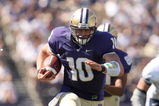 SEATTLE - SEPTEMBER 6:  Jake Locker #10 of the Washington Huskies runs with the ball during their game against the BYU Cougars on September 6, 2008 at Husky Stadium in Seattle, Washington. The Cougars defeated the Huskies 28-27. (Photo by Otto Greule Jr/Getty Images)