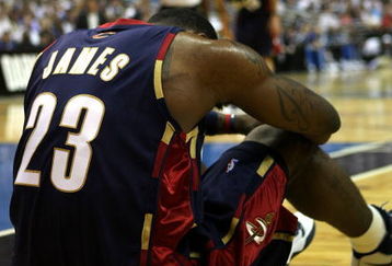 ORLANDO, FL - MAY 30: LeBron James #23 of the Cleveland Cavaliers sits on the court after being fouled by the Orlando Magic in Game Six of the Eastern Conference Finals during the 2009 Playoffs at Amway Arena on May 30, 2009 in Orlando, Florida. NOTE TO USER: User expressly acknowledges and agrees that, by downloading and or using this photograph, User is consenting to the terms and conditions of the Getty Images License Agreement  (Photo by Elsa/Getty Images)