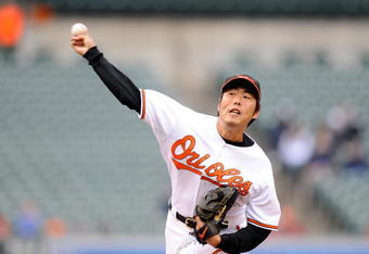 BALTIMORE - APRIL 29:  Koji Uehara #19 of the Baltimore Orioles pitches against the Los Angeles Angels of Anaheim at Camden Yards on April 29, 2009 in Baltimore, Maryland.  (Photo by Greg Fiume/Getty Images)