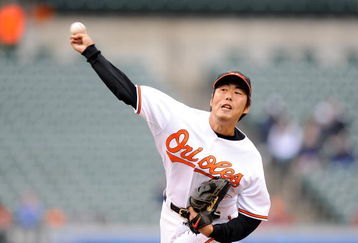 BALTIMORE - APRIL 29:  Koji Uehara #19 of the Baltimore Orioles pitches against the Los Angeles Angels of Anaheim at Camden Yards on April 29, 2009 in Baltimore, Maryland.  (Photo by Greg Fiume/Getty Images)