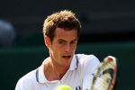 WIMBLEDON, ENGLAND - JUNE 25:  Andy Murray of Great Britain plays a backhand during the men's singles second round match against Ernests Gulbis of Latvia on Day Four of the Wimbledon Lawn Tennis Championships at the All England Lawn Tennis and Croquet Club on June 25, 2009 in London, England.  (Photo by Clive Brunskill/Getty Images)