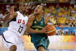 BEIJING - AUGUST 20:  Patrick Mills #5 of Australia drives to the basket over Chris Paul #13 of the United States during the men's basketball quarterfinal game at the Olympic Basketball Gymnasium during Day 12 of the Beijing 2008 Olympic Games on August 20, 2008 in Beijing, China.  (Photo by Streeter Lecka/Getty Images)