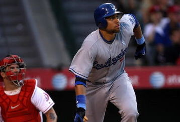 ANAHEIM, CA - JUNE 21:  James Loney #7 of the Los Angeles Dodgers hits a two run home run in the eighth inning against the Los Angeles Angels of Anaheim on June 21, 2009 at Angel Stadium in Anaheim, California.  The Dodgers won 5-3.  (Photo by Stephen Dunn/Getty Images)