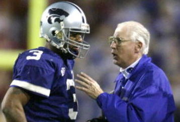 TEMPE, AZ - JANUARY 2:  Head coach Bill Snyder of the Kansas State Wildcats gives directions to quarterback Ell Roberson #3 during the second half of the Fiesta Bowl against the Ohio State Buckeyes on January 2, 2004 at the Sun Devil Stadium in Tempe, Arizona.  (Photo by Elsa /Getty Images)  