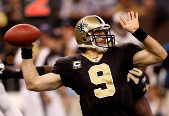 NEW ORLEANS - DECEMBER 28:  Drew Brees #9 of the New Orleans Saints looks to throw a pass against the Carolina Panthers on December 28, 2008 at the Superdome in New Orleans, Louisiana.  (Photo by Chris Graythen/Getty Images)