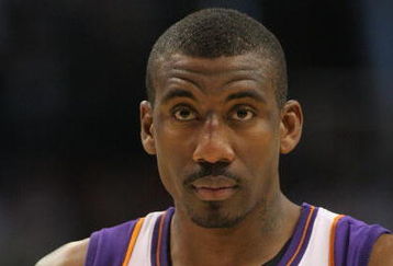 PHOENIX - FEBRUARY 08:  Amare Stoudemire #1 of the Phoenix Suns looks on against the Seattle SuperSonics on February 8, 2008 at US Airways Center in Phoenix, Arizona. NOTE TO USER: User expressly acknowledges and agrees that, by downloading and or using this Photograph, user is consenting to the terms and conditions of the Getty Images License Agreement.  (Photo by Domenic Centofanti/Getty Images)