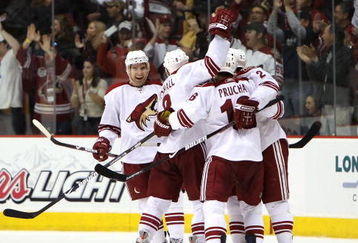 GLENDALE, AZ - APRIL 02:  Matthew Lombardi #15 (L) of the Phoenix Coyotes celebrates with teammates after Scottie Upshall #8 scored a third period goal against the Los Angeles Kings during the NHL game at Jobing.com Arena on April 2, 2009 in Glendale, Arizona. The Coyotes defeated the Kings 2-1. (Photo by Christian Petersen/Getty Images)