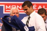 MONTREAL, QC - JUNE 26:  Nazem Kadri puts on his new Toronto Maple Leafs sweater after he was selected #7 overall by the Leafs during the first round of the 2009 NHL Entry Draft at the Bell Centre on June 26, 2009 in Montreal, Quebec, Canada.  (Photo by Bruce Bennett/Getty Images)