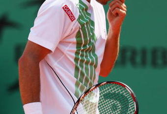 PARIS - JUNE 01:  A dejected Tommy Haas of Germany heads towards defeat during the Men's Singles Fourth Round match against Roger Federer of Switzerland on day nine of the French Open at Roland Garros on June 1, 2009 in Paris, France.  (Photo by Ryan Pierse/Getty Images)